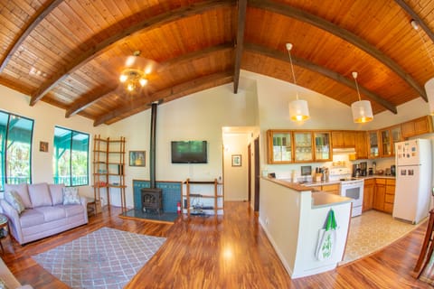 Take in the spacious interior and high vaulted pine ceilings upon entering.