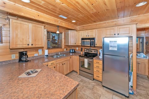 Kitchen features all stainless steel appliances and is stocked with essentials for preparing meals!