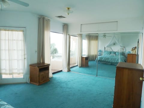huge master suite  ocean views from  windows/balcony. Private bathroom
