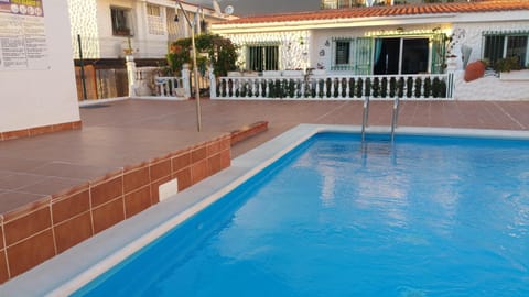 front view of Bungalow / Villa in front of pool