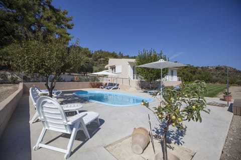 Pool area and villa facing North West.
