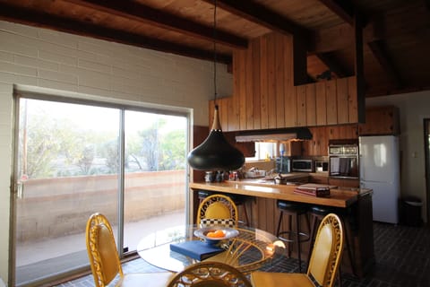 There are views to the natural desert from the sliding doors off the dining area