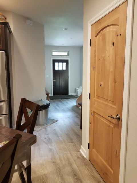 Looking back at the front door and pantry.