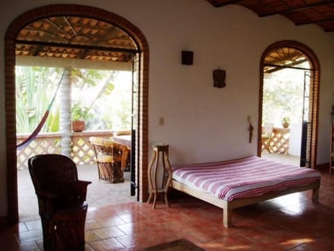 The livingroom area that opens up on to the big private porch.