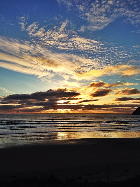 Sunset from the beach in front of our beach house
