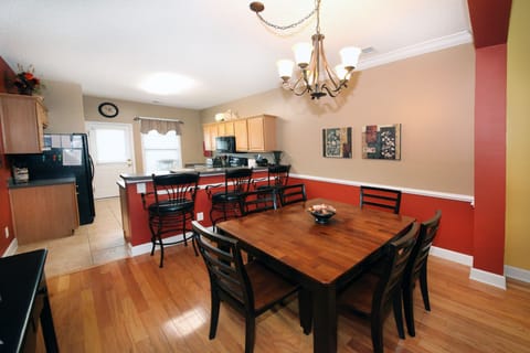 Dining room with seating for 6 and 3 additional bar stools