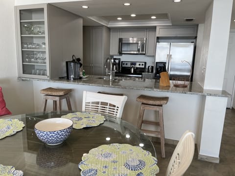 Contemporary styled, beach themed condo. 

Dining table seats 6. 
