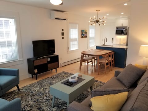Open plan living, dining, kitchen.
