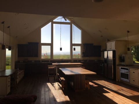kitchen, big windows look out to east
