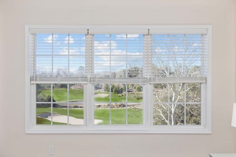 Master bedroom; golf course view from the BED!