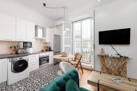 Kitchenette with living room with 2 love seat with 2 armchairs