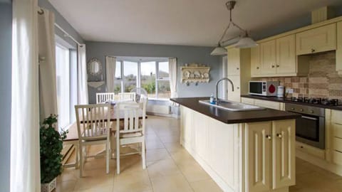 Large dining table with room to seat up to 10 guests