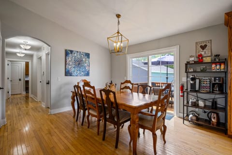 Dining room: walkout to the deck with plenty of shaded seating options & grill!