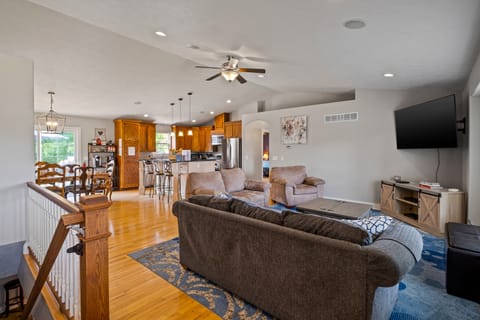 Main floor living room with 65" 4K UHD cable Smart TV with Netflix capability!