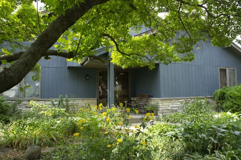 Home front entrance and perennial garden yard.