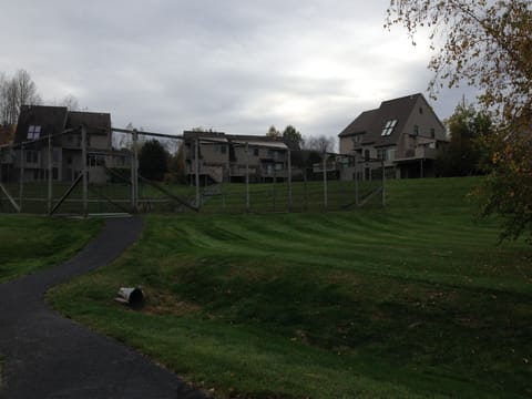 Neighborhood tennis courts and outdoor pool in walking distance.