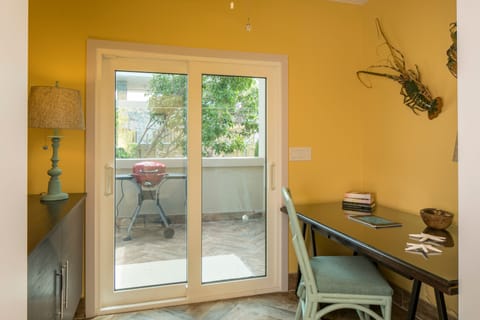 Office with entry to rear deck for grilling!