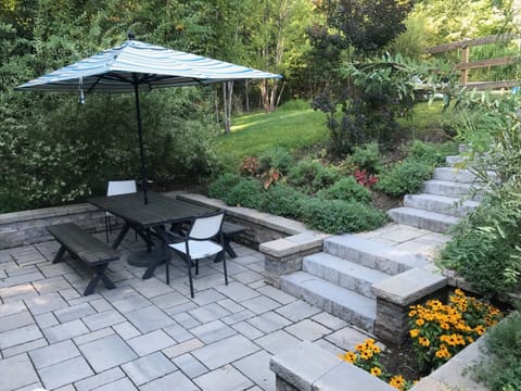 back deck with gas grill and table