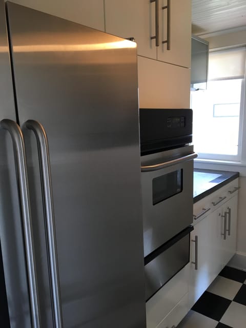 Pantry off kitchen with 2nd oven and large refrigerator