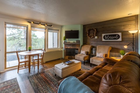 Beautiful setting with fireplace and new smart TV.