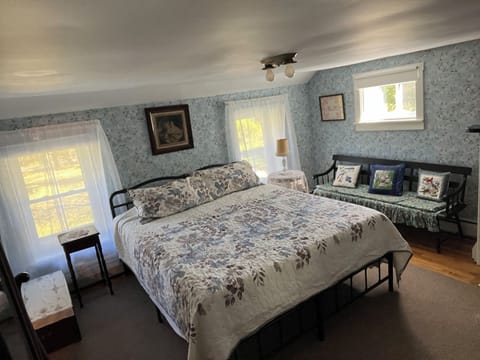 Master bedroom features California king bed.