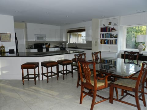 Open kitchen includes everyone in the great room