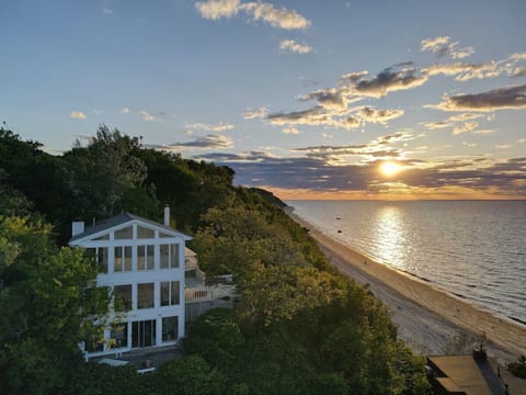 Aerial view of waterfront house on Long Island Sound bluff