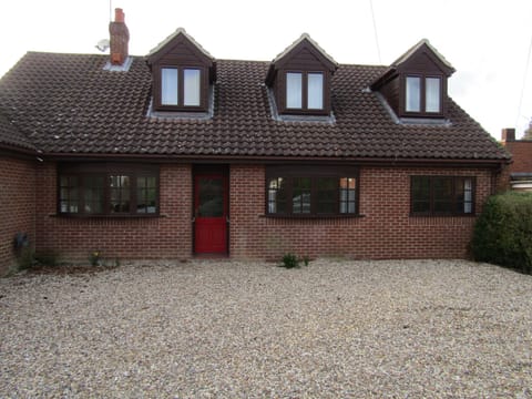 Front. The accomodation occupies the ground floor only. Ample parking.