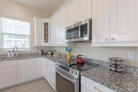 Cook together in a bright, modern kitchen