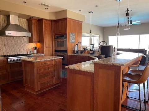 Kitchen is adjacent to family room.