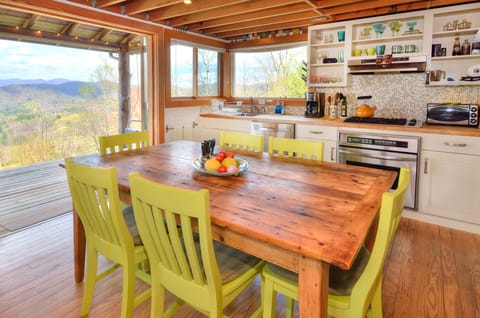 Kitchen and Dining Room adjacent to living room space. Dine with a VIEW