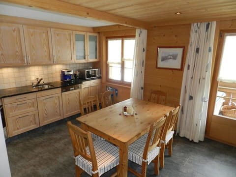 Cabinetry, Property, Furniture, Table, Countertop, Window, Wood, Chair, Sink, Interior Design