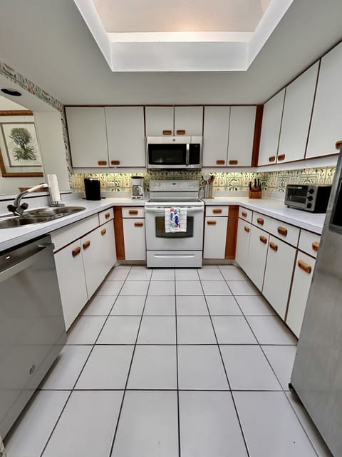 Fully stocked kitchen with huge skylight