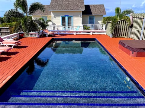 The pool with the villa behind. Both Atlantic ocean and Caribbean sea views.