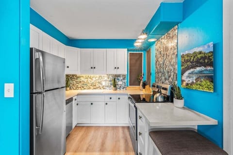 Fully equipped kitchen with modern stainless steel appliances and everything you need