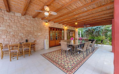 Dining room for 18 people in front of the central kitchen