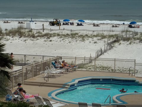 View from balcony of pool and beach