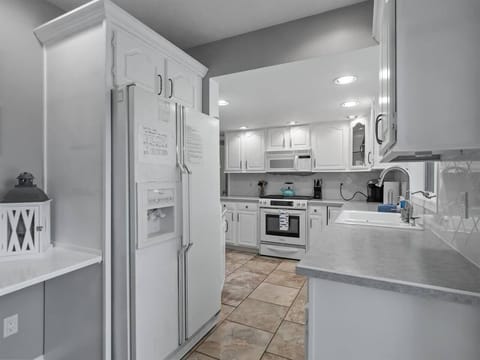 Third view of fully stocked kitchen