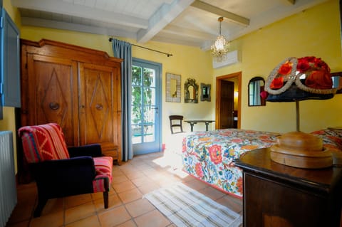 Private bedroom with it's own bathroom. Door walks out to the outdoor patio.