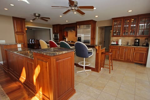 Overview of Kitchen. Designed to serve buffet style meals. Granite countertops.