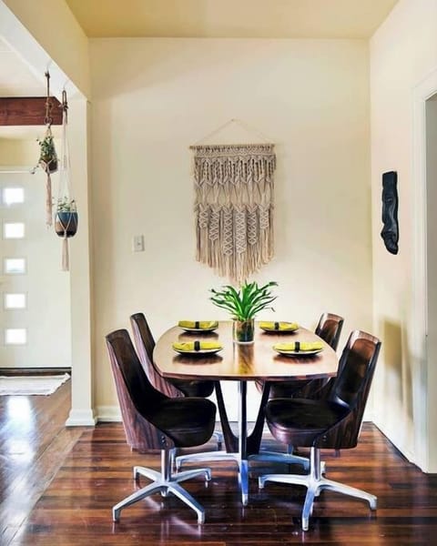 Macrame defines the dining space, with swivel chairs and large dining table that make everyone feel like hanging out.