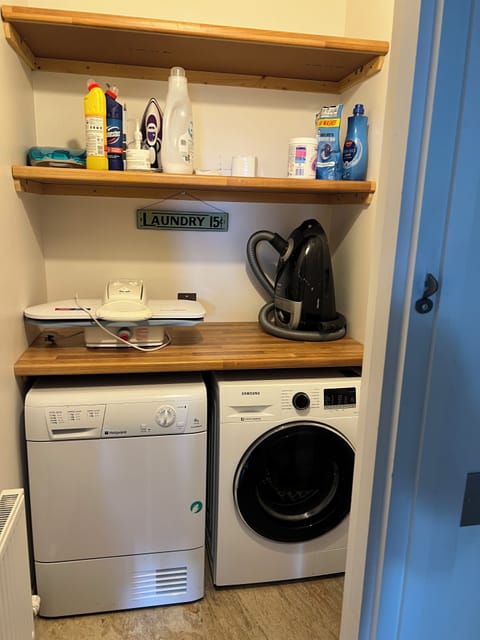 US style laundry room off Bedroom 2
be European and peg-out instead of drying!