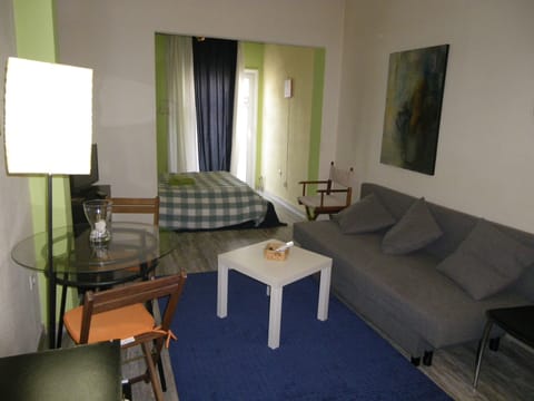 Angle of the ini suite with the bedroom in the background 