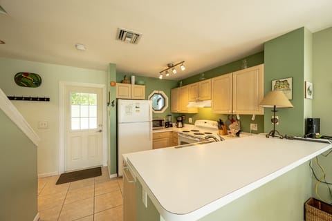 Kitchen/Entrance - Full Kitchen. Coffee maker, blender, toaster, microwave all you need to stay in for a meal.
