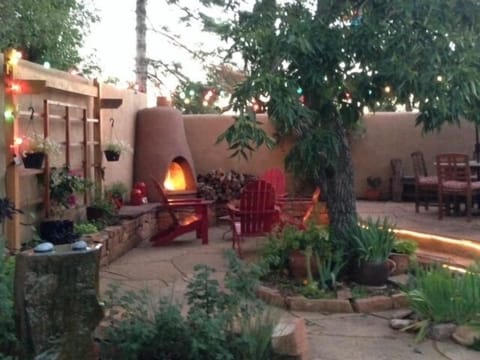 Private outdoor patio - Kiva fireplace, gardens, and fountain