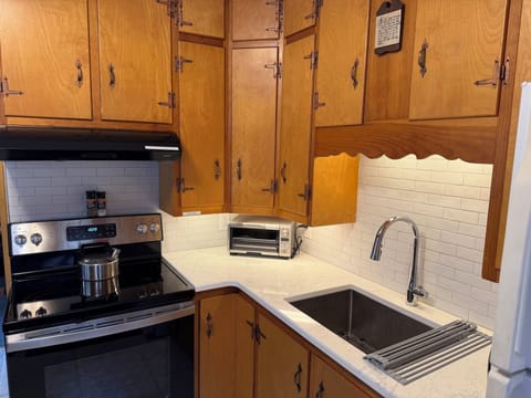 Very well stocked kitchen.