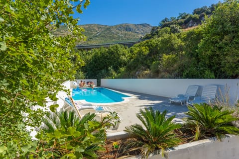 Pool with deck chairs on disposal 