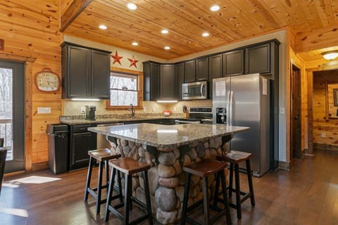 Fully Equipped Kitchen with Granite Countertops & Large Island