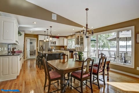 dining area facing gourmet kitchen