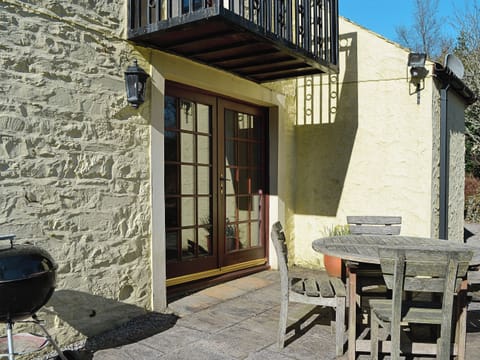 A set of patio chairs and a table make a great place for a bbq | Arkland Mill - Crofts Cottages, Near Castle Douglas